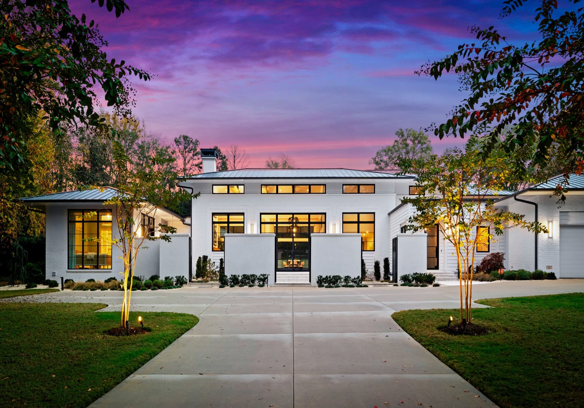 Twilight exterior of a luxury home on Loch Lane