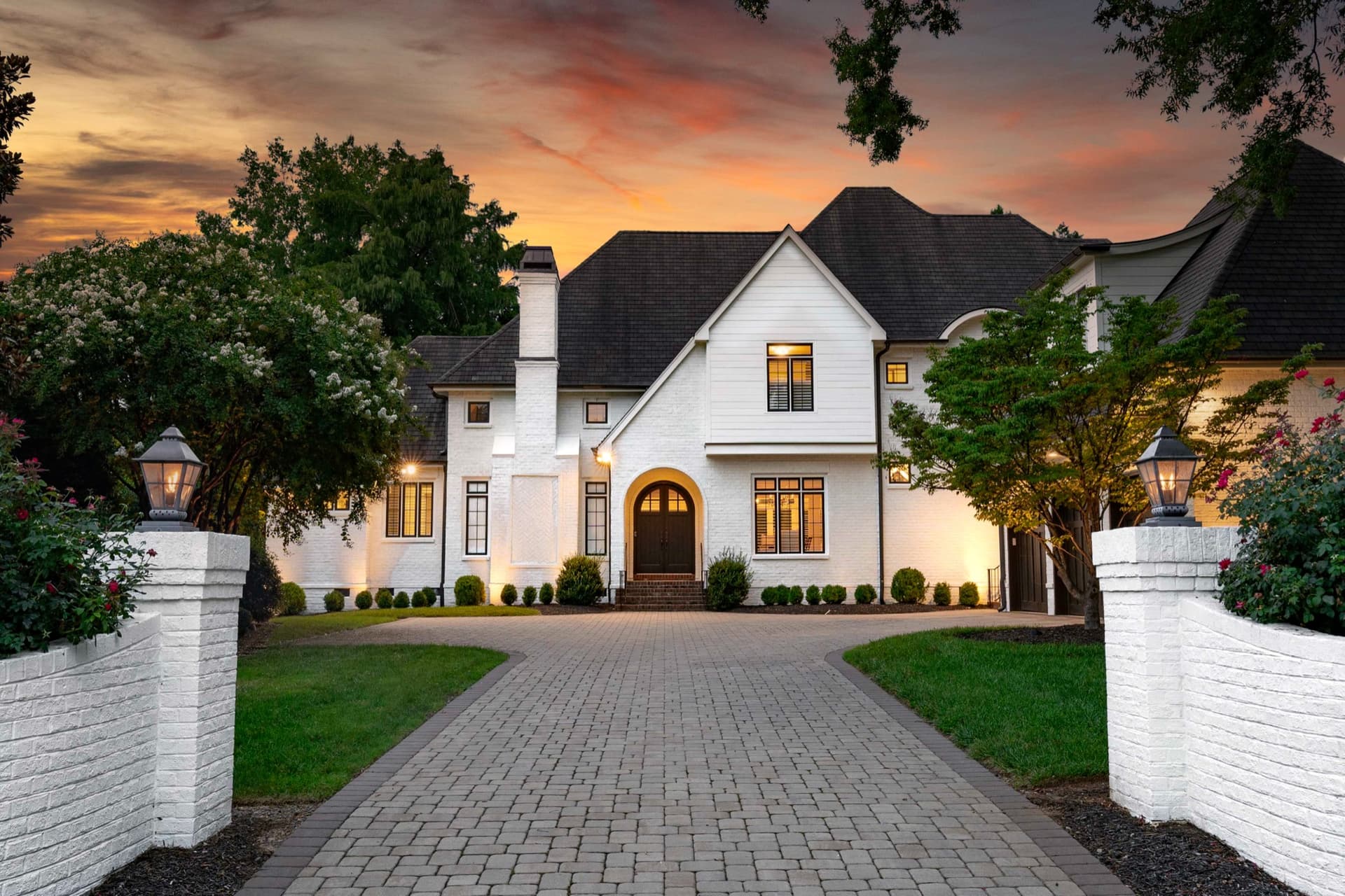 Luxury white brick residence at twilight, Morrocroft, Charlotte